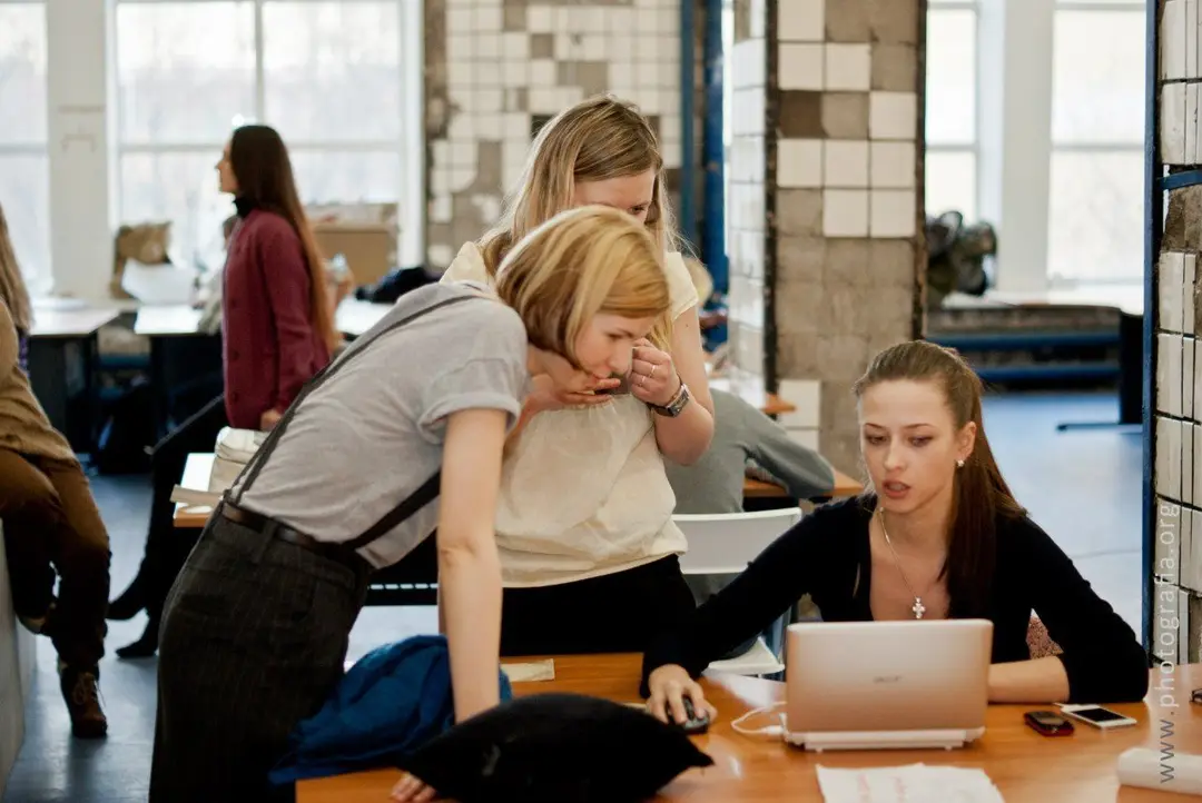 People collaborating in a shared workspace