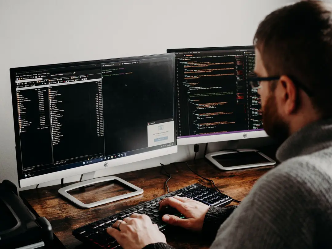Developer workspace with multiple screens
